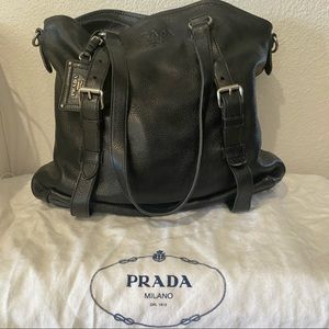 Prada black pebbled deerskin convertible bag.